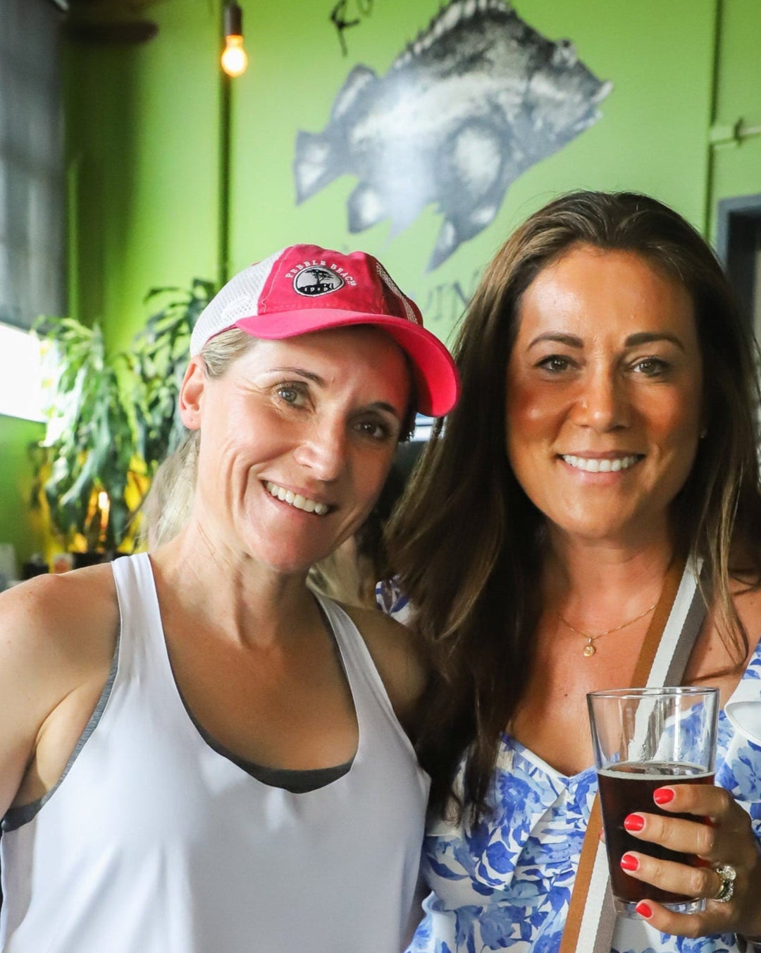Two women enjoying drinks on the Charlottesville Ale Trail
