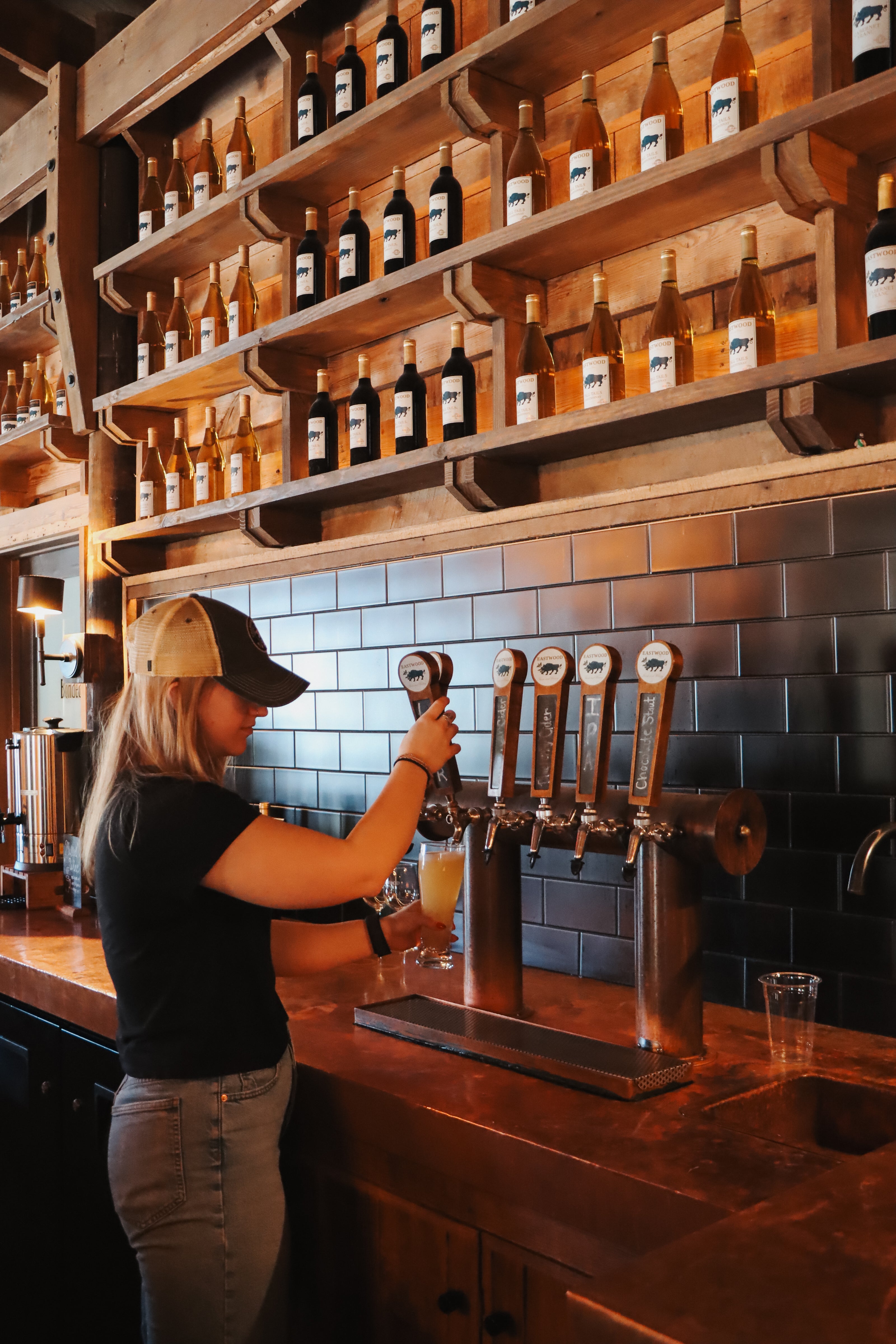 Eastwood tap, pouring beer
