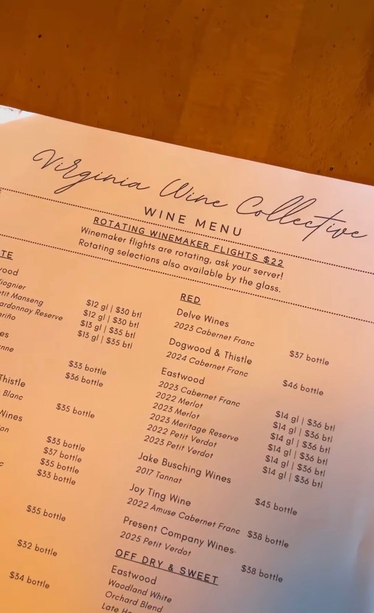 Virginia Wine Collective wine menu on a wooden table